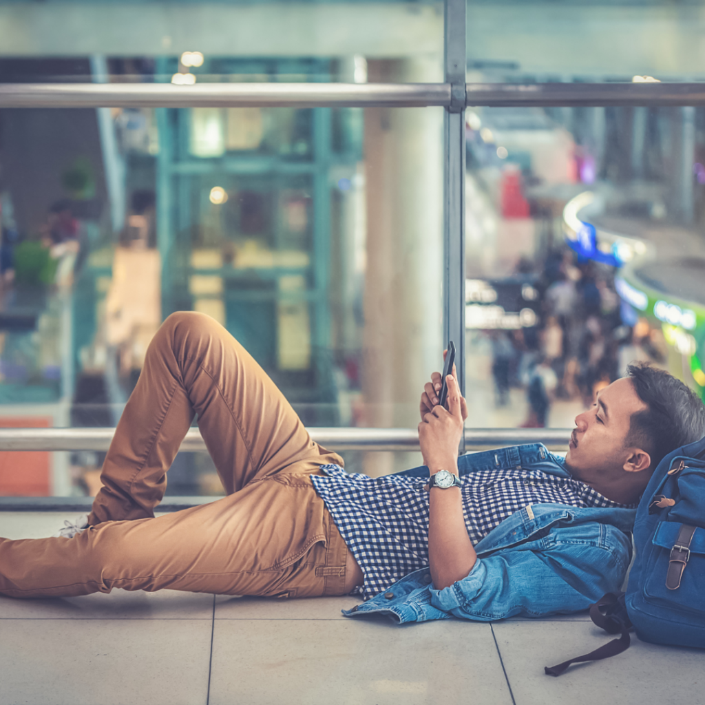 An image of someone delays due to flight disruptions. Flight Delay Claim